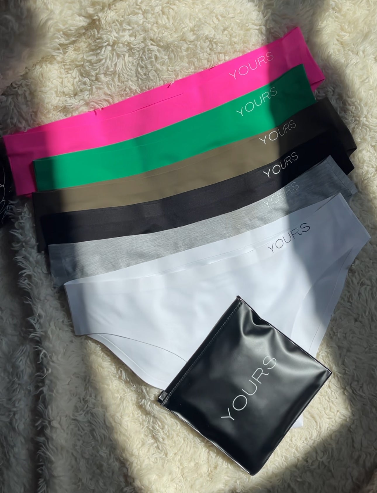 6 colors of seamless Clean Brief underwear neatly stacked 