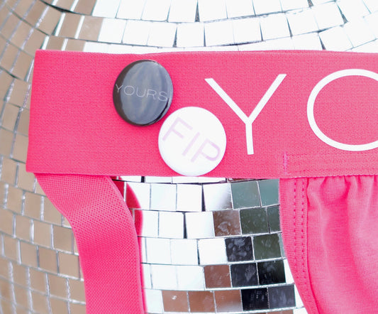 Pink Jockstrap on a Disco Ball close up of pins 